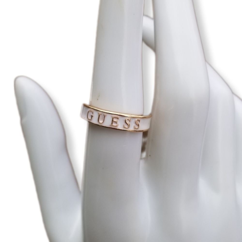 GUESS Gold Tone White Enamel Logo Band Ring - Size 6.5